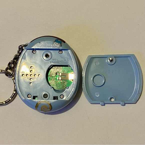 Ancien jeu électronique, Tamagotchi plus, vert / green, Bandai 2004